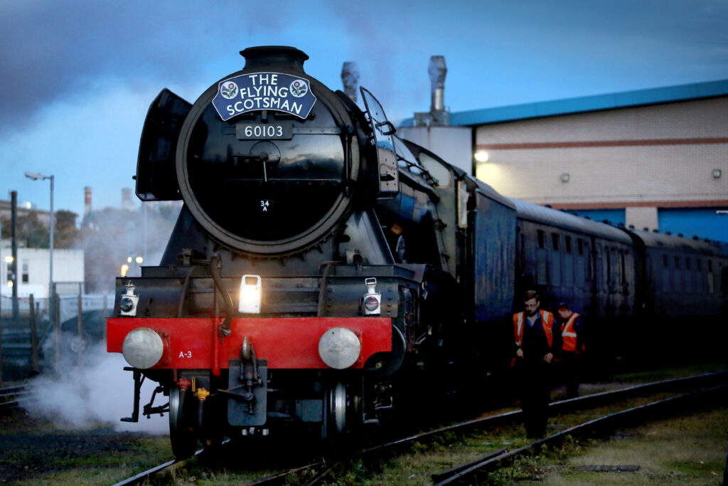 Flying Scotsman steam train at Pickering Station, ready to depart through the scenic North York Moors during the Railway 200 celebrations.