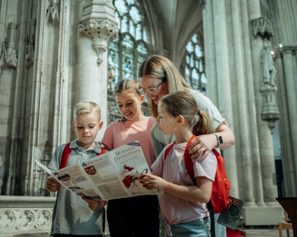 Children exploring York Minster with trail maps and activity packs during October Half Term. • Little Vikings - York for Kids Children exploring York Minster with trail maps and activity packs during October Half Term.