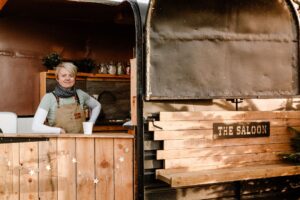 Children meeting friendly alpacas at Sheriff Alpacas near York – a fun, hands-on family experience where you can walk, feed and learn all about these gentle animals in beautiful countryside surroundings.