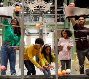 Family enjoying Wonderlab at the National Railway Museum in York on a rainy weekend