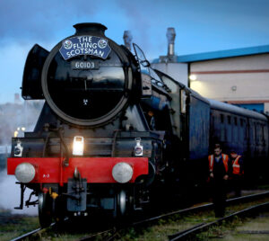 Flying Scotsman steam train at Pickering Station, ready to depart through the scenic North York Moors during the Railway 200 celebrations.